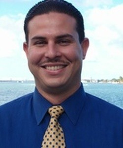 Carlos E. Gomez